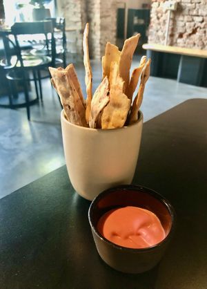Crackers with beetroot dip  at Lom Dopolavoro in Milan