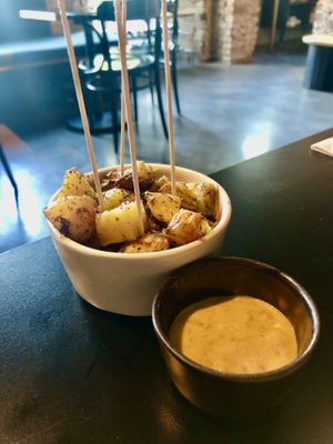 Rosemary potatoes with artichoke dip  at Lom Dopolavoro in Milan