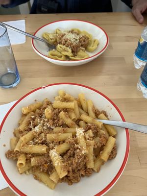 Pumpkin ravioli (yum), bolognese pasta (good)  at La Vegana in Ferrara