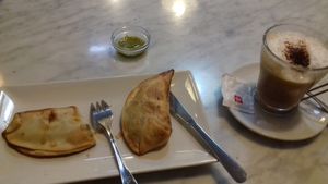 Various vegan pies, cappuccino with almond milk at Santoni - When food is the solution in Barcelona