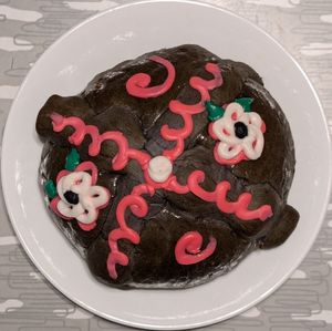 pan de muerto decorated by 222 Pastry at La Casa de Mamá - Pop Up in Portland