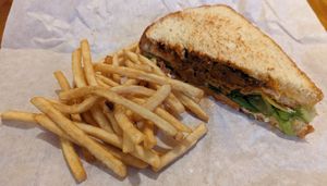 half of Mirisata's Chick'n Club Sando (no tomato) with some fries at Cooper's Co-op Cafe in Portland
