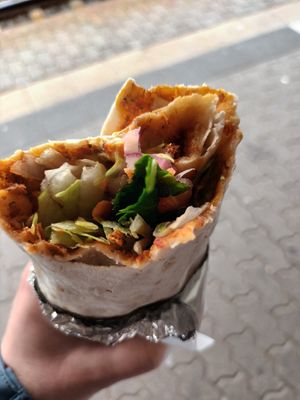 Lahmacun with salad and yoghurt sauce at Veganland in Saarbrucken