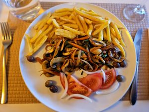 Not on the menu, but I asked for it: sautéed mushrooms.and chips. They added onion, carrot, green beans in a light soy sauce, and tomato.  It was great! at Floresta in Fatima