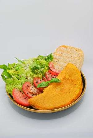 Vegan chickpea flour omelette with vegan cheddar cheese at Ninna Homemade Bakery in Dubai