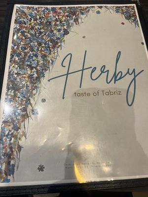 menu cover  at Herby Restaurant in Toronto
