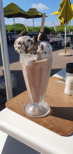 Cooking and cream at Surf Riders Cafe  in Durban