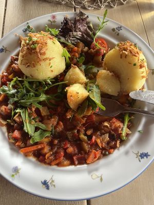 Kartoffelknödel mit Gemüse Ratatouille  at Alpengasthof Schwedenschanze in Lochau