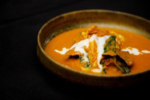 แกงปูใบชะพลู   gang pu bai cha plu
southern turmeric curry of blue swimmer crab with betel leaf and calamansi lime
 at Nahm  in Bangkok