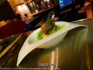 Golden Artichoke - Lightly fried golden artichokes served on a bed of refreshing fennel at Invitation V in Montreal