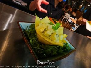 Spring flowers (Aromatic Thai crunchy curry)served on a bed of organic greens at Invitation V in Montreal
