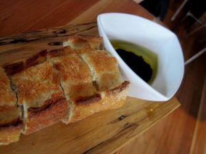 The bread comes from a local bakery. It is amazing. at Invitation V in Montreal