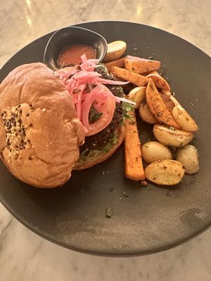 Beet burger with potatoes   at Cafe Communidad in Mexico City