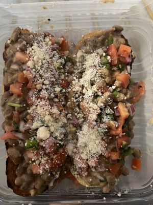 Molletes as delivery order  at Café Mas in Chicago