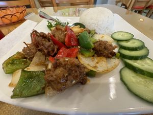 Lemongrass and pepper “chicken” - it’s marked as spicy, but I used the table sauce to make it spicier.   at Chay Restaurant in Falls Church