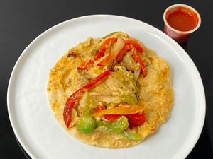 chicken cheesy fajita taco - where’s the chicken? (plated at home) at Tim's Tavern in Seattle