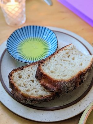 Bread service with olive oil at Cook Weaver in Seattle