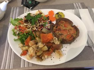 Carrot and cumin tart with an amazing salad and mixed root veggies  at Ah! La Belle Histoire in Concarneau