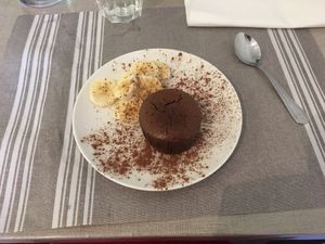 An incredibly tasty warm chocolate fondant with banana  at Ah! La Belle Histoire in Concarneau