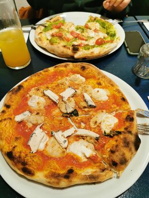 Quattro Formaggi and Pesto Pizza at Meow Pizzeria Verde in Innsbruck