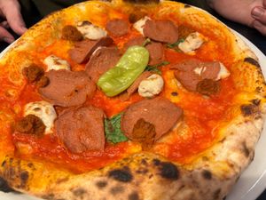 Red hot chili pesto pizza at Meow Pizzeria Verde in Innsbruck