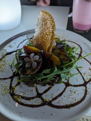 Grilled peach, lentil and argula salad at Replika in Dubai