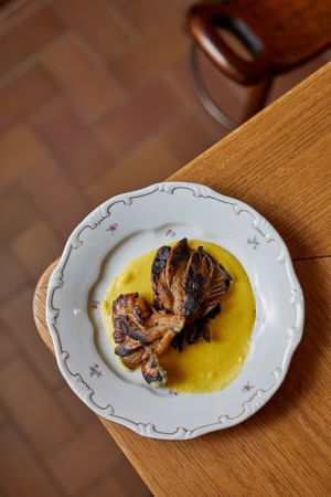 Oyster mushroom with vegan polenta at Goli Restaurant in Budapest