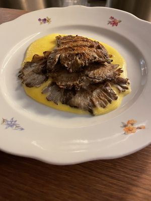 Oyster mushrooms with a sweet corn polenta  at Goli Restaurant in Budapest