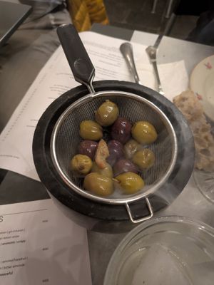 Smoked Olives: 3.5/5 cool smoke but not best flavor
 at Goli Restaurant in Budapest