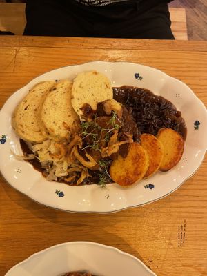 Mixed platter; bread dumplings, cabbage (yummy), seitan  at Moment in Prague