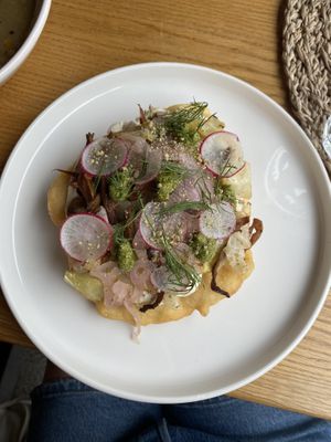 lopas with pesto and dill sauce. smoked mushrooms on top  at Moment in Prague