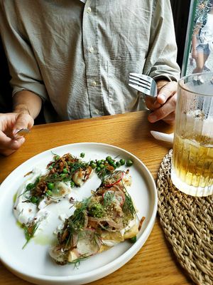 Shared a plate: pierogi left - langos right at Moment in Prague