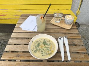 Leech Soup (Daily Menu) with homemade Rhubarb-Ginger Lemonade and Cappuccino with oatmilk  at Moment in Prague