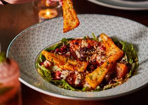 Halloumi & warm harissa baked 
squash salad

cider & mustard leeks, spinach, rocket, 
pomegranate salsa, lemon & garlic 
tahini dressing, hot honey, tamari 
toasted seeds at Cosy Club in Canterbury