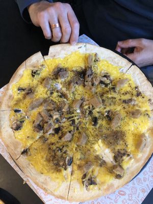 the yellow thing is the cheese   at Del Poble Pizzería Ruzafa in Valencia