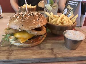 burger with onion rings and walnut dip  at The Street - Belehradska in Prague