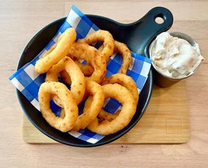 Onion rings with herb dip at The Street - Belehradska in Prague