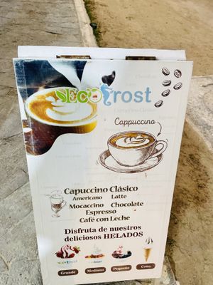 Sign on the sidewalk, they also sell coffees  at Ecofrost in Puerto Villamil