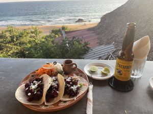 Tacos de Flor de jamaica, una ensalada y una chela y la vista. Todo riquísimo !  at Cabañas Mágico Atardecer in Oaxaca