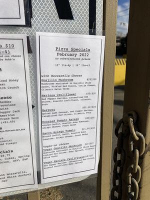 menu: pizza specials  at Nick's Pizza in Oakland