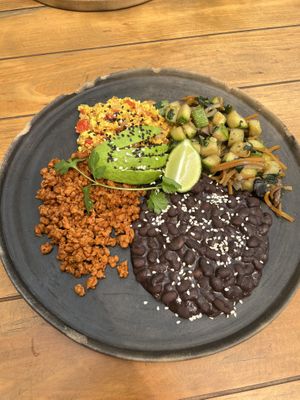 Gluten free breakfast bowl, subbed bread for extra beans. Added avocadoo  at Sweet Spot in Puerto Escondido