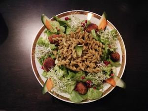 One of the main courses, a pasta dish with salad and (soy)meatballs  at Symbiose in Leipzig
