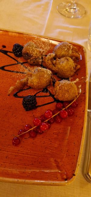 Sweet sciatt (kind of fried bigne) filled with dark chocolate at Valtellina in Livigno