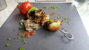 Wild mushroom shish kebab on smoky eggplant puree at Zakaim - Vegan Boutique in Tel Aviv