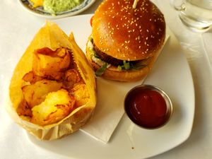 The impossible burger with smashed potato "chips" at Zakaim - Vegan Boutique in Tel Aviv
