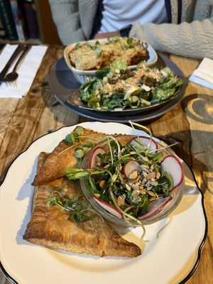 Lasagna bolognaise with wide cessation salad, spanikopita with side green salad   at Lola Rosa - Parc in Montreal