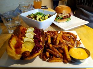 Hotdog, spicy black bean burger, and poutine at Lola Rosa - Parc in Montreal