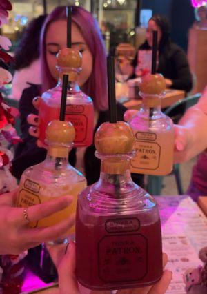 valentine’s day margaritas from the margarita tree! so strong we all felt them so much 😵‍💫  at JoJo's Shake Bar in Orlando