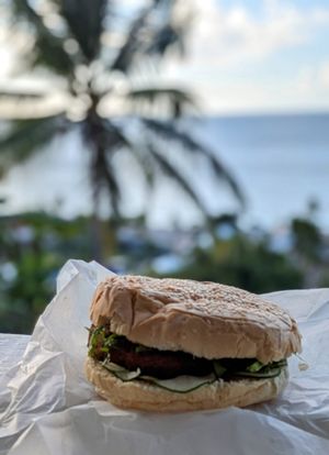 Local pigeon pea patty (say that 5x fast) 😲 at Love Thyself Vegan Kitchen in St Georges