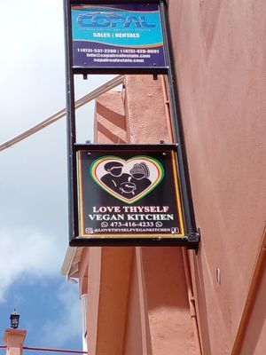 Sign board at Love Thyself Vegan Kitchen in St Georges